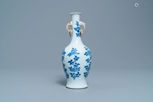 A Chinese blue and white vase with elephant-head