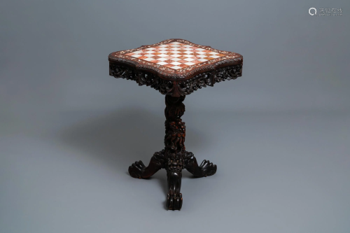 A Chinese carved wooden side table with marble