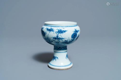 A Chinese blue and white stem cup with floral design,