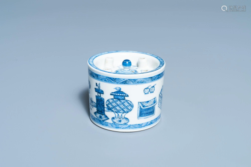 A Chinese blue and white inkwell with antiquities