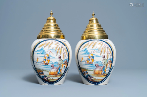 A pair of polychrome Dutch Delft tobacco jars with a