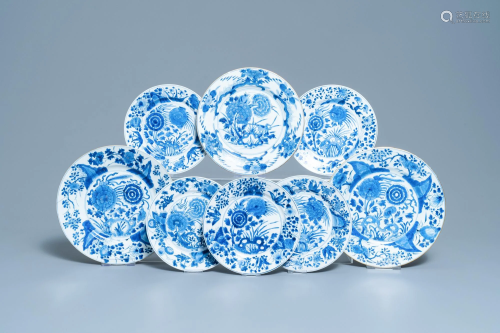 Eight Chinese blue and white plates with birds among