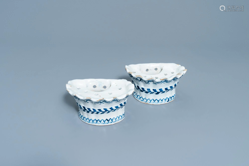 A pair of blue and white French faience bouquetieres or