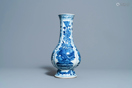 A Chinese blue and white bottle vase with flower
