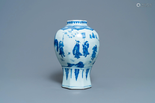 A Chinese blue and white vase with figures in a