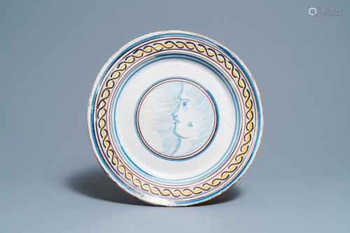 A large polychrome Spanish faience 'portrait' dish,