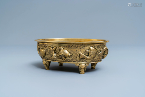 A Chinese oval bronze censer with fish, Xuande mark,