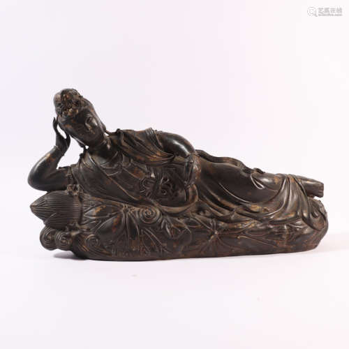 A bronze lying buddha statue