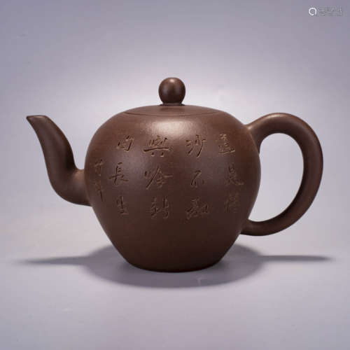 A purple clay inscribed teapot