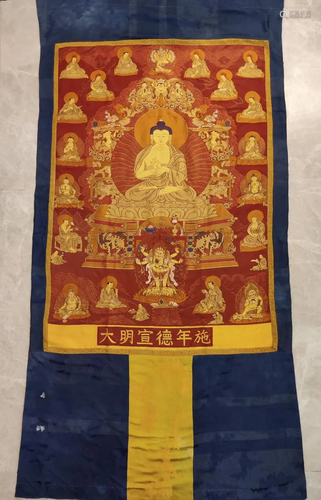 A BROCADE THANGKA OF SHAKYAMUNI