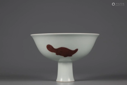 AN UNDERGLAZED RED 'FISH' STEM BOWL