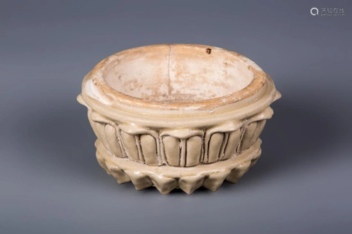 A BEIGE GLAZED LOTUS PEDESTAL