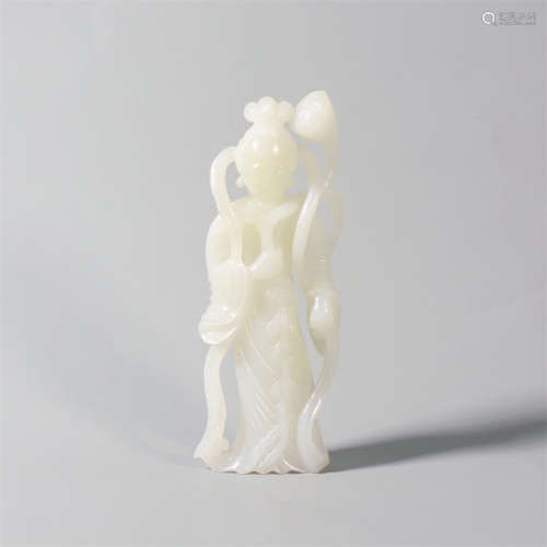 A carved hetian white jade guanyin statue
