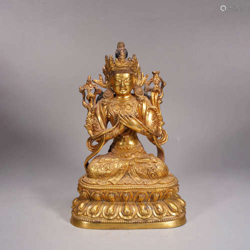 A gilt bronze statue of green tara