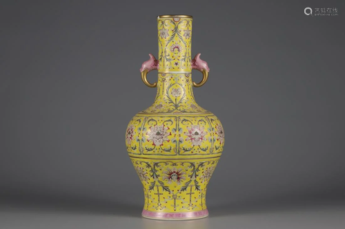 A DOUBLE-EAR YELLOW GROUND FAMILLE ROSE VASE