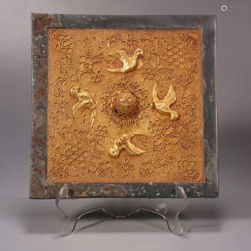 A filigree gilt bronze birds square mirror