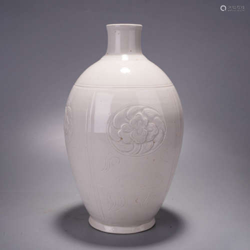 A ding ware white glaze peony globular vase