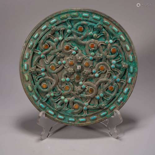 An openwork bronze dragon circular mirror