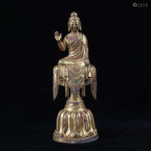 A gilt bronze buddha statue