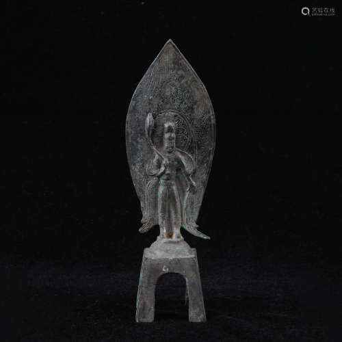 An archaistic bronze statue of avalokitesvara