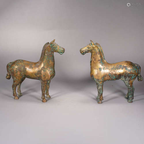 a pair of gilt bronze horse ornaments