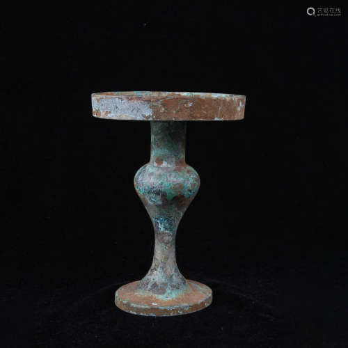An archaistic style bronze candlestick