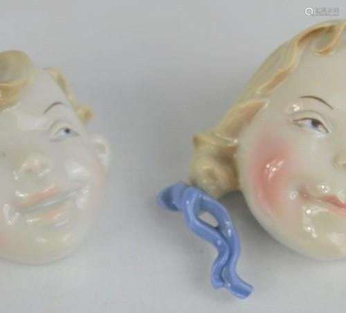 Deux masques de garçon et de fille en porcelaine Metzler et ...
