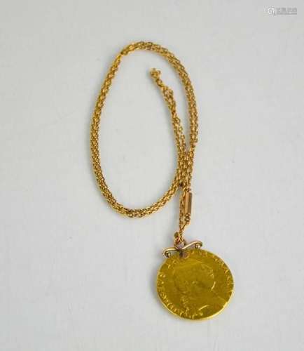 Une chaîne en or 9ct et un pendentif en guinée daté de 1790,...