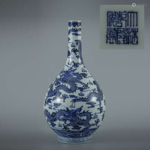 A blue and white dragon bottle vase