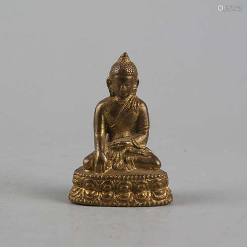 A gilt bronze buddha statue