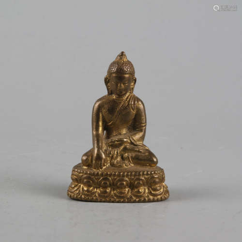 A gilt bronze buddha statue