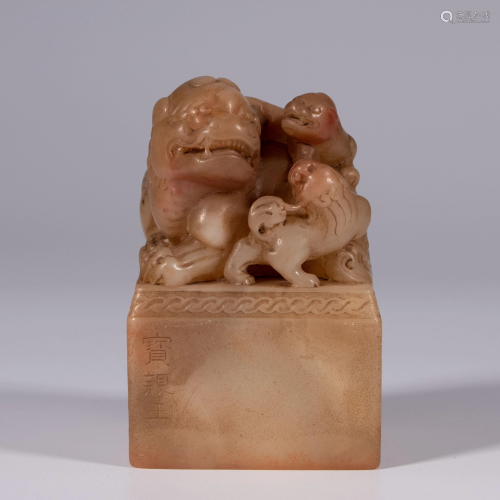 CARVED SOAPSTONE LION AND YOUNG SEAL
