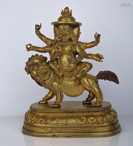 Gilt Bronze Figure of Guardian Riding Lion