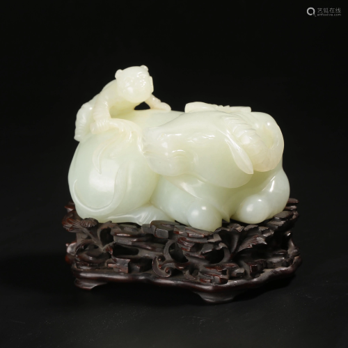 FINE HETIAN JADE CARVING OF BOY RIDING A BULL