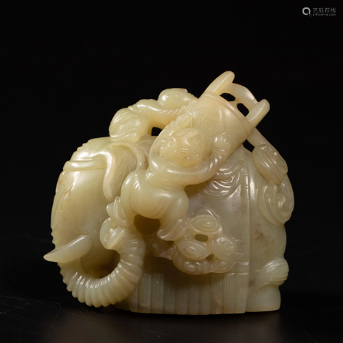 CARVED HETIAN YELLOW JADE 'BOY AND ELEPHANT' ORNA…