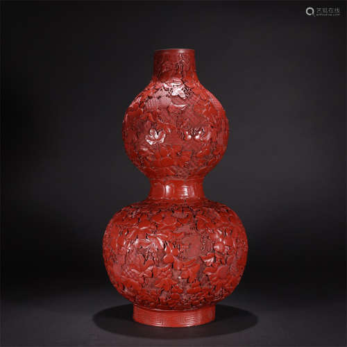 A cinnabar lacquer double-gourd-shaped vase