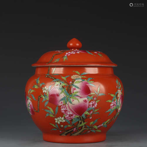 An iron-red-glazed famille rose nine peaches tea caddy and c...