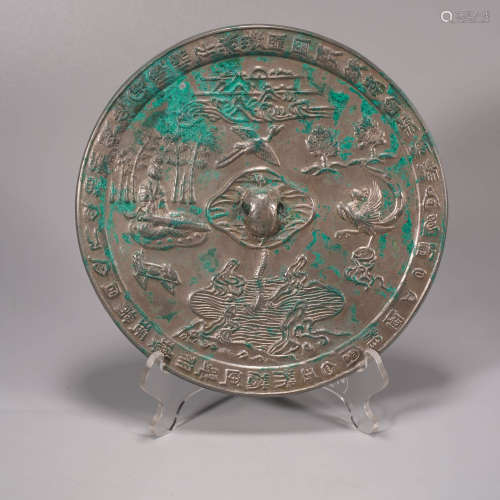 A bronze figure and crane circular mirror