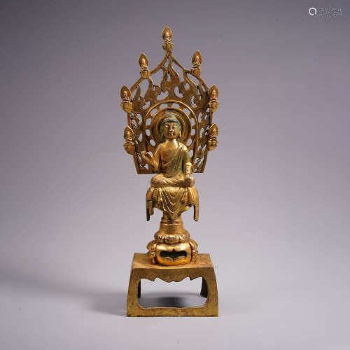 A gilt bronze buddha statue