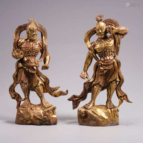 A pair of bronze statue of guardians