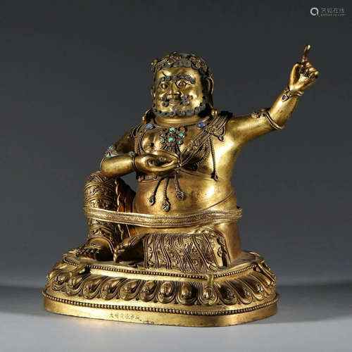 GEM-INLAID GILT BRONZE FIGURE OF MAHASIDDHA