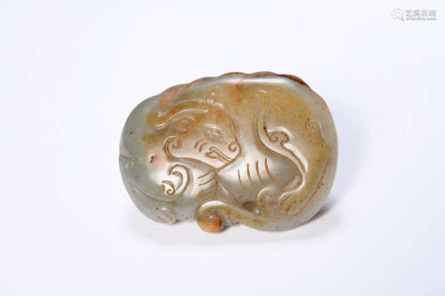 A Celadon And Russet Jade Belt Hook Carving Of A Mythical Be...