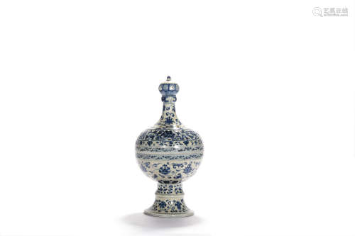 A Blue And White Floral Incense Burner And Cover