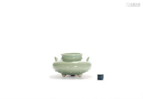 A Celadon-Glazed Double-Eared Tripod Vase, Zun