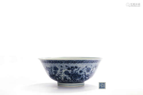 A Blue And White Fish And Waves Bowl