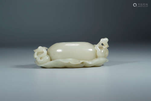 A Carved Jade Petal-Form Water Coupe