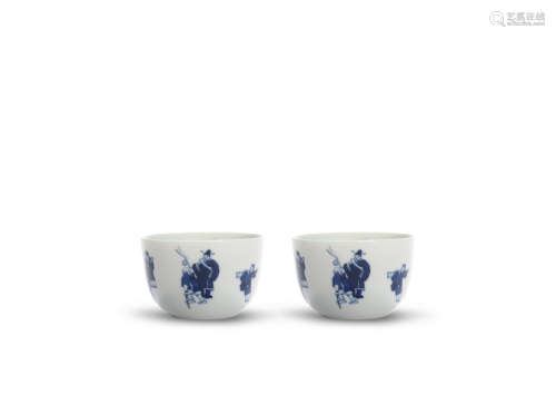 A Pair Of Blue And White Figural Cups