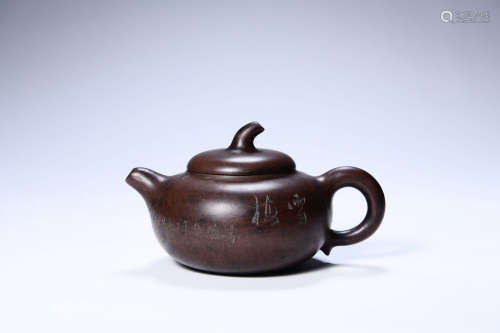 A Purple Clay Inscribed Teapot