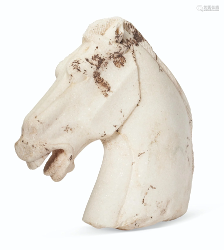 A LARGE WHITE MARBLE HORSE HEAD
