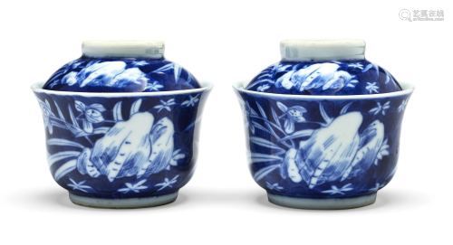 A PAIR OF BLUE AND WHITE 'IRIS AND STONES' BOWLS AND